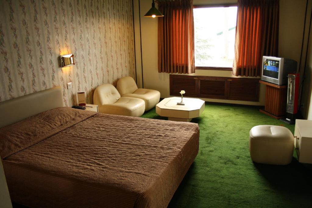 Honeymoon Inn Shimla Rom bilde